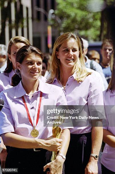 Members of the U.S. Women's National Soccer Team are led by Mia Hamm and Brandi Chastain, who scored winning goal in the Women's World Cup in soccer,...