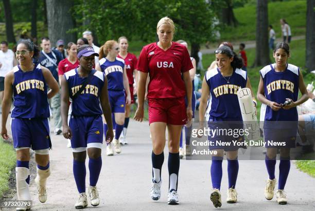 Women's softball team pitcher Jennie Finch joins members of the Hunter College team in Central Park. The U.S. Team was on hand for a practice session...