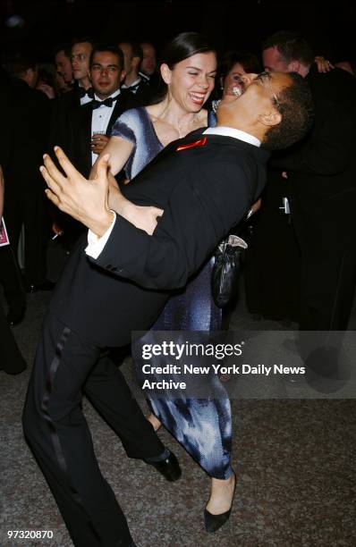 Gregory Hines dances with girlfriend Negrita Jayve at party in Rockefeller Center following the Tony Awards ceremony.