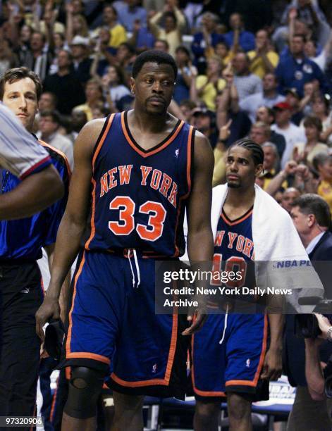 New York Knicks' Patrick Ewing leaves the court followed by Kurt Thomas at end of Game 5 of the NBA Eastern Conference finals at Conseco Fieldhouse....