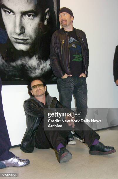 S Bono and The Edge attend the opening reception for the photo exhibit "Anton Corbijn - U2 & I" at the Stellan Holm Gallery on W. 24th St. The show...