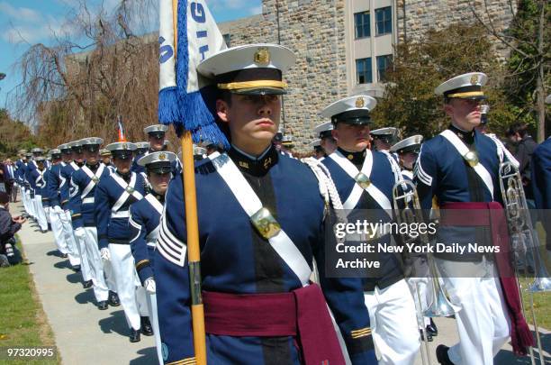 Members of the Virginia Tech Cadet Corps march to Cassell Coliseum to attend a memorial service for those who died in yesterday's school massacre....