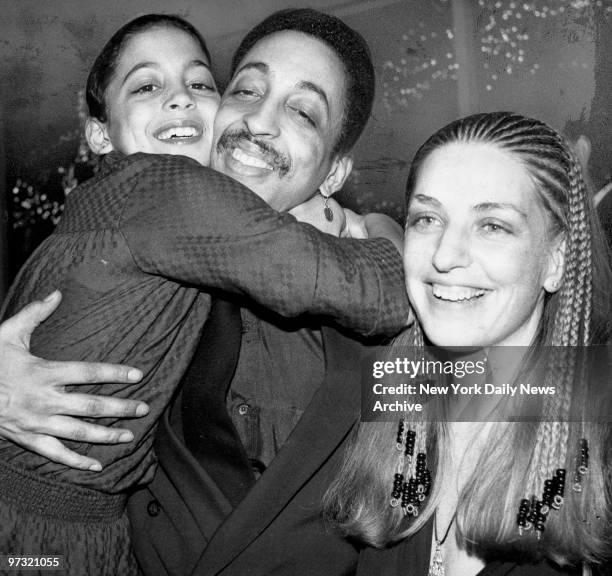 Gregory Hines with daughter Daria and wife Pamela during opening night party for "Sophisticated Ladies" at Tavern on the Green, 21st March 1981.