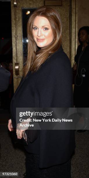 Julianne Moore presents a pregnant profile on arrival at the Revlon 10th anniversary gala for the National Breast Cancer Coalition at the Hammerstein...