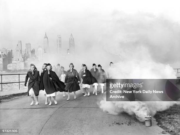 Members of U.S.Army Nurses staff at the Post Hospital in Fort Jay on Governor's Island undergo at tear-gas drill.