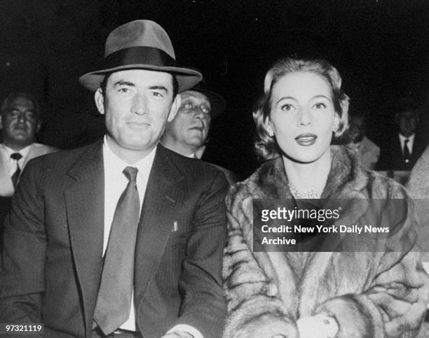 Gregory Peck and Veronique Peck at the Moore-Marciano fight at Yankee Stadium.