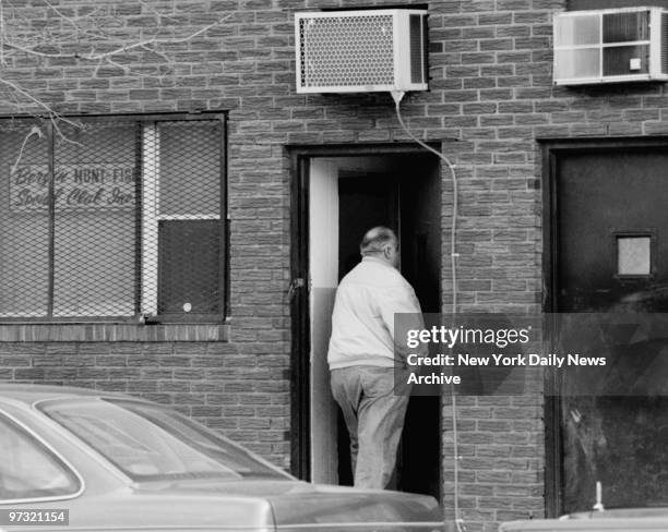 Unidentified man entering the Bergin Hunt and Fish Social Club in Ozone Park.