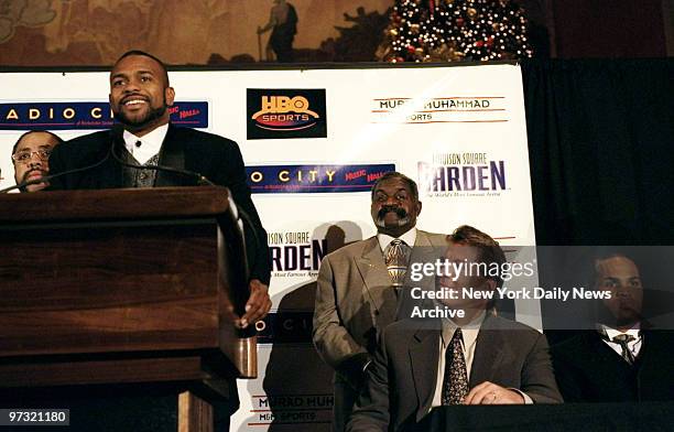 Unified light-heavyweight champion Roy Jones Jr. Speaks at news conference as Madison Square Garden president Dave Checketts looks on at Radio City...