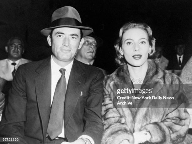 Gregory Peck with Veronique Peck at the Moore-Marciano fight at Yankee Stadium.