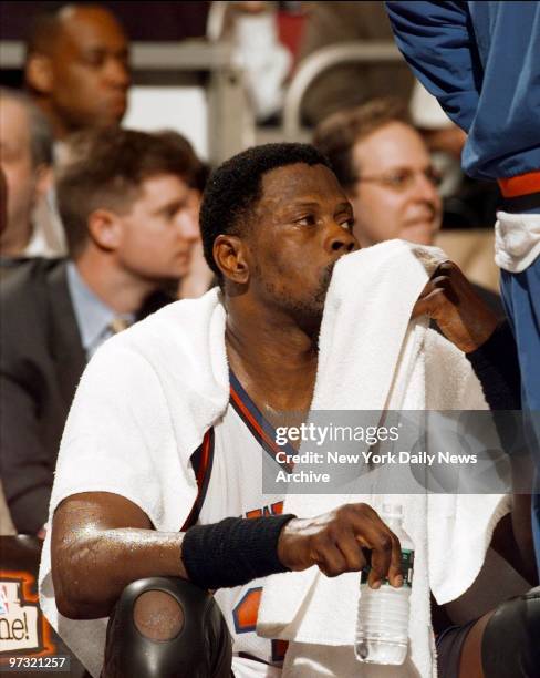 New York Knicks' Patrick Ewing watches from the bench during game against the Boston Celtics at Madison Square Garden.