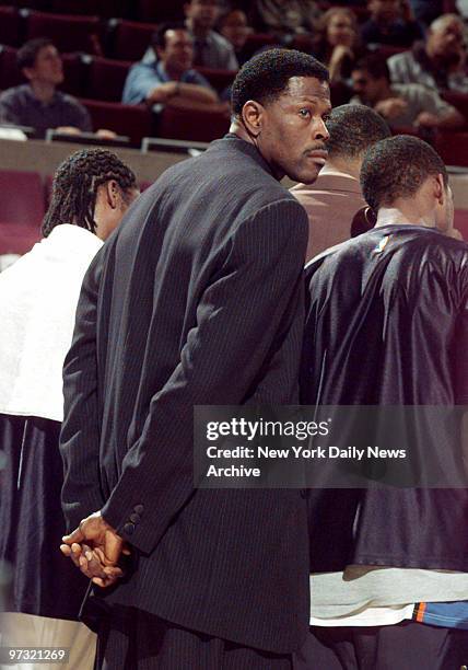 New York Knicks' Patrick Ewing watches from the sidelines during preseason game between the New York Knicks and New Jersey Nets at Madison Square...