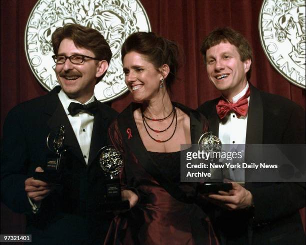 Julie Taymor , Best Director of a Musical for "The Lion King," flanked by the play's producers, Thomas Schumacher and Peter Schneider, during Tony...