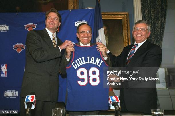 New York Knicks' President David Checketts and NBA Commissioner David Stern present Mayor Rudy Giuliani with a Giuliani 98 jersey. The 1998 NBA...