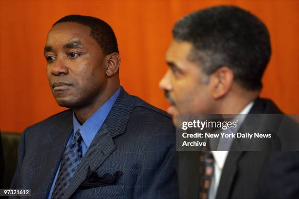 New York Knicks' president Isiah Thomas speaks to the media with his attorney, Steve Mills, at their midtown office. Thomas is being sued for sexual...