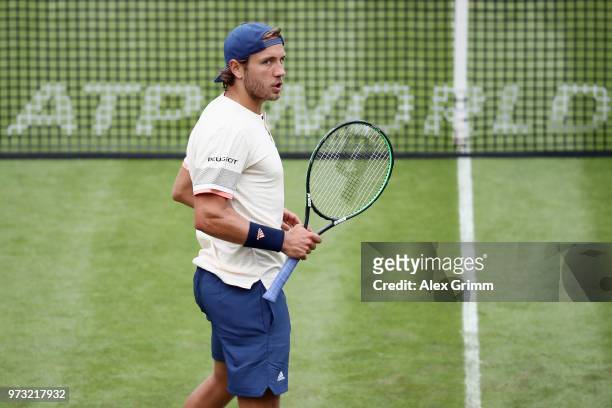 Lucas Pouille of France celebrates after winning his match against Rudolf Molleker of Germany during day 3 of the Mercedes Cup at Tennisclub...