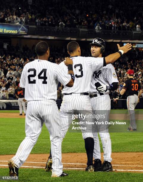 New York Yankees vs. Baltimore Orioles at Yankee Stadium. Robinson Cano and Alex Rodriguez lead Yankees out of dugout to congratulate Derek jeter on...