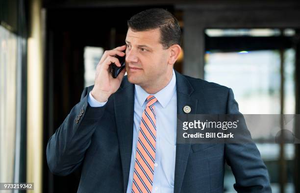 Rep. David Valadao, R-Calif., leaves the House Republican Conference meeting at the Capitol Hill Club in Washington on Wednesday morning, June 13,...