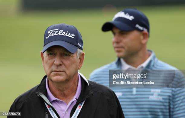 Jay Haas and son Bill Haas of the United States look on during a practice round prior to the 2018 U.S. Open at Shinnecock Hills Golf Club on June 13,...