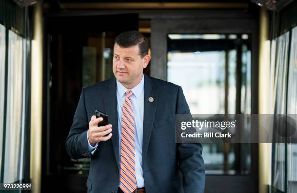 Rep. David Valadao, R-Calif., leaves the House Republican Conference meeting at the Capitol Hill Club in Washington on Wednesday morning, June 13,...