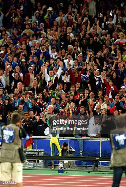 Cathy Freman of Australia celebrates after winning the Women's 400m final held at Olympic Stadium during the Sydney 2000 Olympic Games, Sydney,...