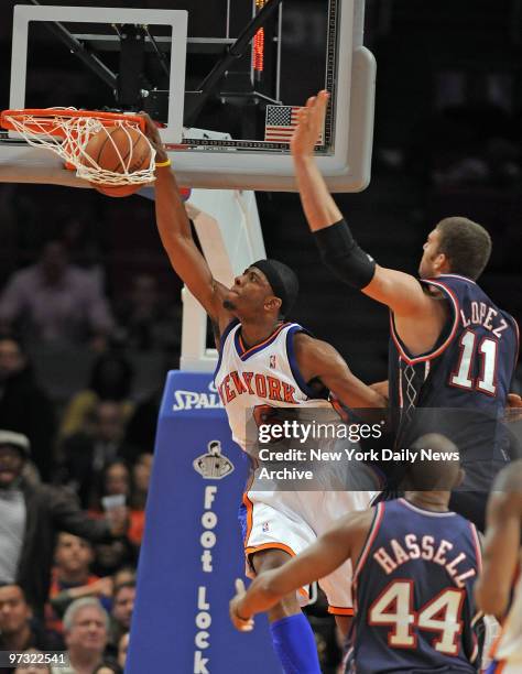 New York Knicks vs New Jersey Nets. Knicks Patrick Ewing Jr. Slams home 2nd dunk inthe 4th quarter.