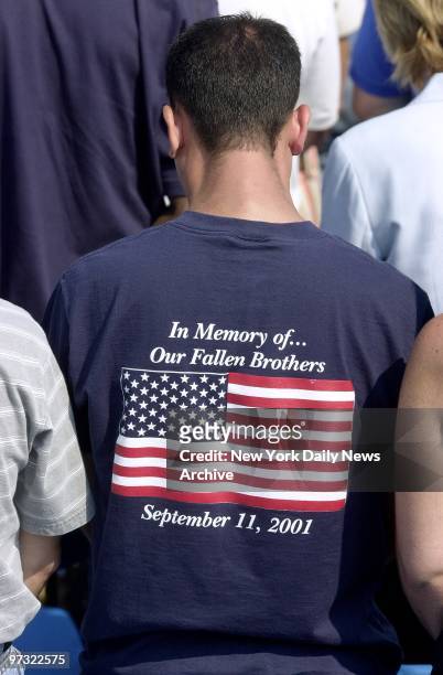 Message on T-shirt conveys the mood of those on hand at a solemn ceremony marking the formal end of the search for human remains in the World Trade...