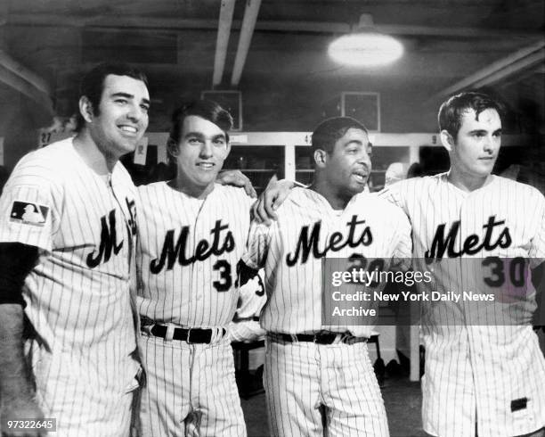 Met heroes Ed Kranepool, Gary Gentry, Tommie Agee and Nolan Ryan beam after game 3 of the World Series at Shea Stadium.