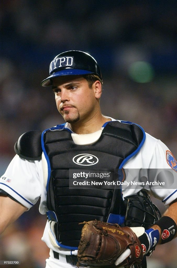 New York Mets' catcher Mike Piazza wears a New York City Pol