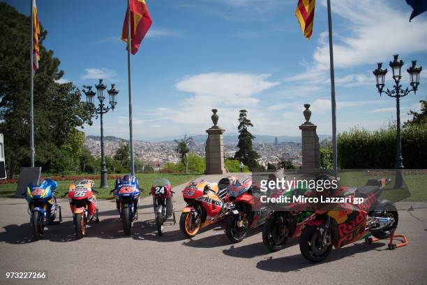 The MotoGP bikes of the Spanish riders and the bike of Salvador Caellas of Spain park during the pre-event "Past meets present: MotoGP" during the...