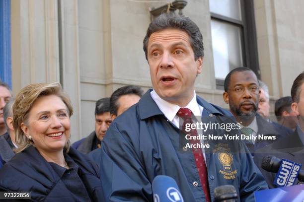 Democratic state attorney general candidate Andrew Cuomo speaks outside the 1st Precinct stationhouse on Ericsson Place as incumbent Sen. Hillary...