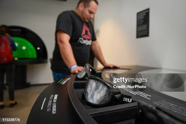 Man looks at goggles that simulate drunkenness at the Polish Vodka Musuem on June 12, 2018 in Warsaw, Poland.