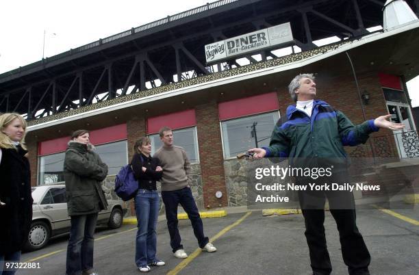 Guide Marc Baron , talks to tourists in the parking lot of the Skyway Diner under the Pulaski Skyway in South Kearny, N.J. Baron, an actor who has...