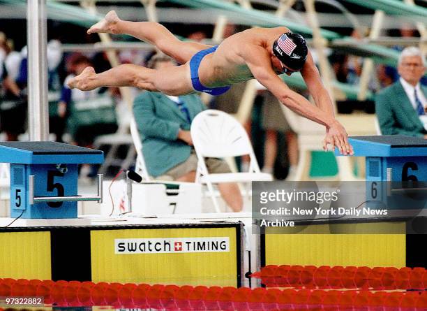 United States swimmer Gary Hall Jr. Dives into the pool on his way to a silver medal in the 100-meter freestyle competition at the Summer Olympic...