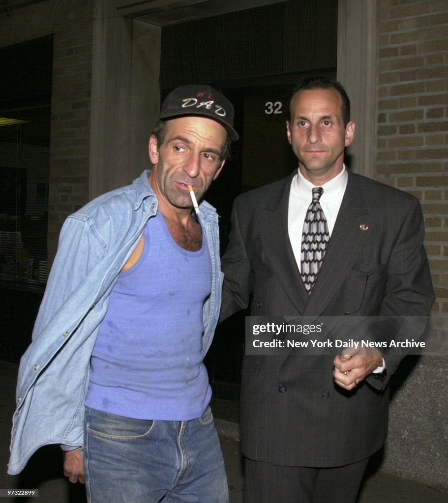 Tritto Guido Tritto is led out of the Staten Island district attorney's ...