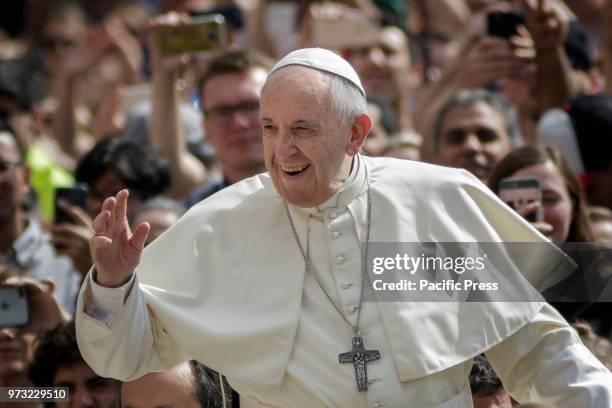 Pope Francis waived to the audience during the Weekly General Audience in St. Peter's Square.