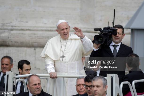 Pope Francis waived to the audience during the Weekly General Audience in St. Peter's Square.