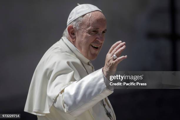 Pope Francis waived to the audience during the Weekly General Audience in St. Peter's Square.