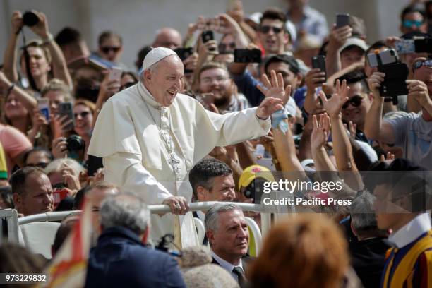 Pope Francis waived to the audience during the Weekly General Audience in St. Peter's Square.