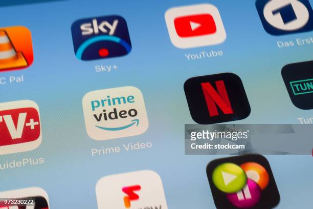 netflix, amazon prime and other video streaming apps on ipad screen - big tech stock pictures, royalty-free photos & images