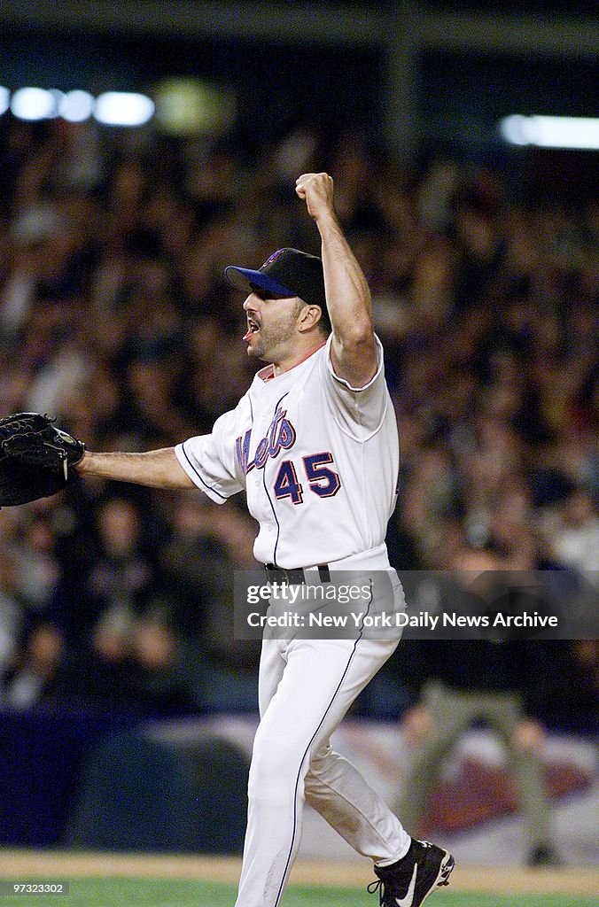 Mess Pitcher Mets' relief pitcher John Franco raises his fist in the air after ...