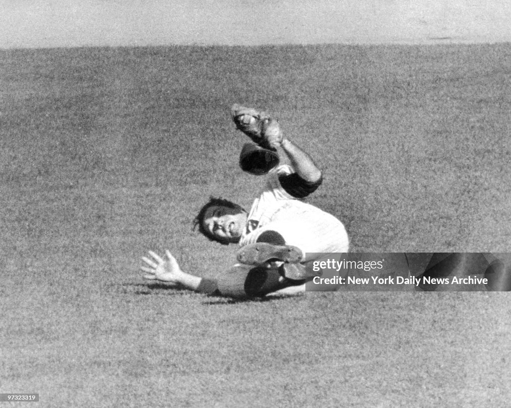 Mets' Ron Swoboda has ball in his glove after making a divin