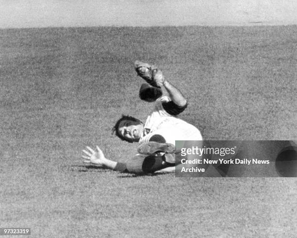 Mets' Ron Swoboda has ball in his glove after making a diving catch of Brooks Robinson's ninth-inning liner in the fourth game of the '69 World...