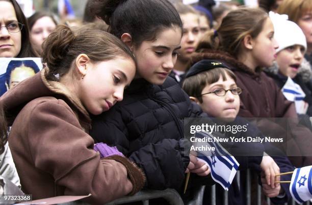 Demonstrators look on at a pro-Israel rally at Dag Hammarskjold Plaza, 47th St. And Second Ave.