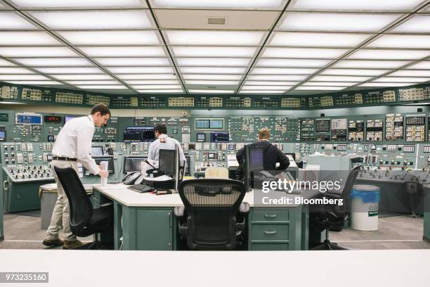 Reactor operators work in the control room at the Exelon Corp. Three Mile Island nuclear power plant in Middletown, Pennsylvania, U.S., on Wednesday,...