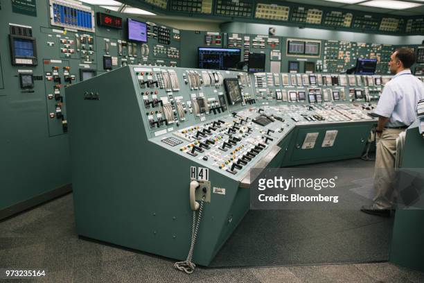Reactor operator works in the control room at the Exelon Corp. Three Mile Island nuclear power plant in Middletown, Pennsylvania, U.S., on Wednesday,...
