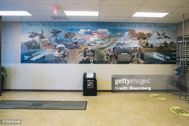 Mural honoring U.S. Veterans hangs on display at the Exelon Corp. Three Mile Island nuclear power plant in Middletown, Pennsylvania, U.S., on...