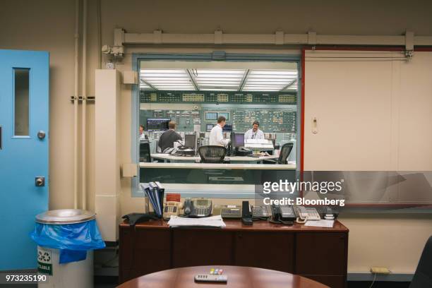 Workers are seen in the control room of the Exelon Corp. Three Mile Island nuclear power plant in Middletown, Pennsylvania, U.S., on Wednesday, April...