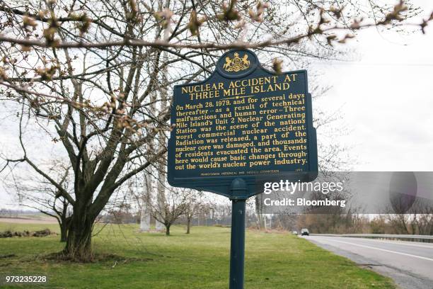 Historical marker recognizing the 1979 nuclear meltdown at the Exelon Corp. Three Mile Island nuclear power plant stands outside the company's...