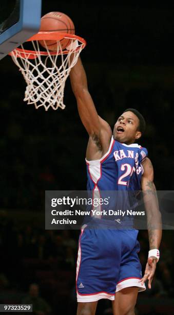 Kansas Jayhawks' Brandon Rush dunks the ball during Game 1 of the Jimmy V Classic against the St. Joseph's Hawks at Madison Square Garden. The Hawks...