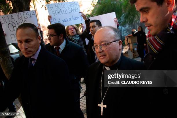 Students demonstrate against the sexual abuse scandal within the Church in Chile as Vatican's top abuse investigator Maltese archbishop Charles...